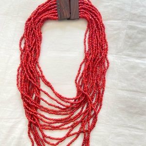 Read bead necklace with wooden clasp